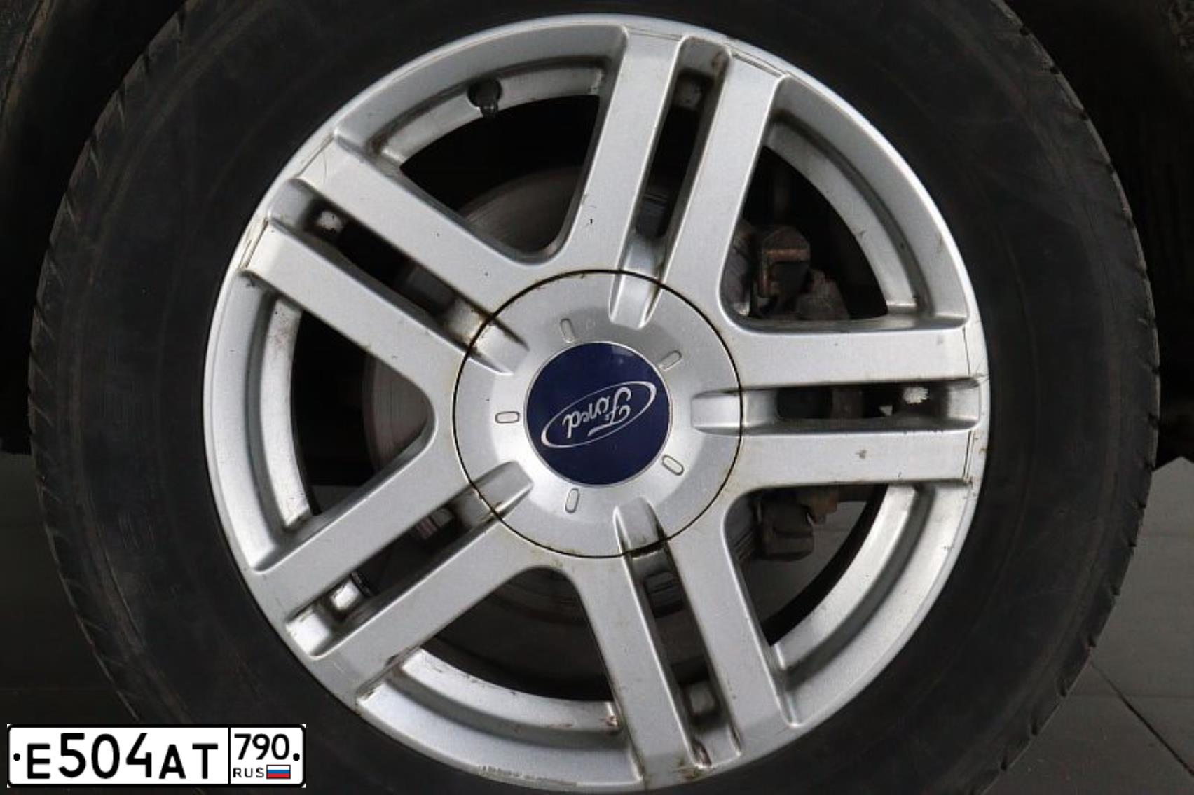 Фото автомобиля FORD FUSION, 2005 — госномер Е504АТ790. Цвет: ЗЕЛЕНЫЙ СВЕТЛЫЙ