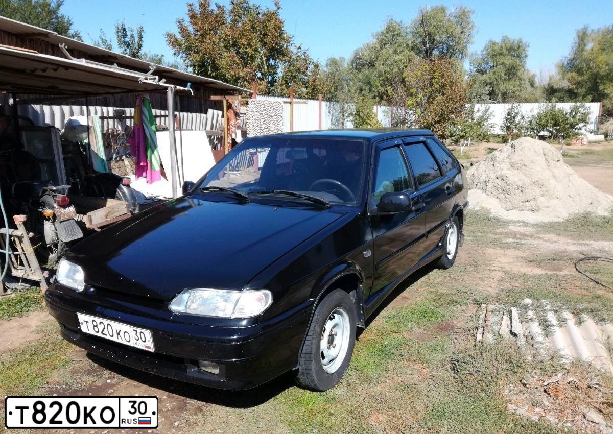 Фото автомобиля LADA 2114 SAMARA, 2011 — госномер Н354НО30. Цвет: Сине-Черный