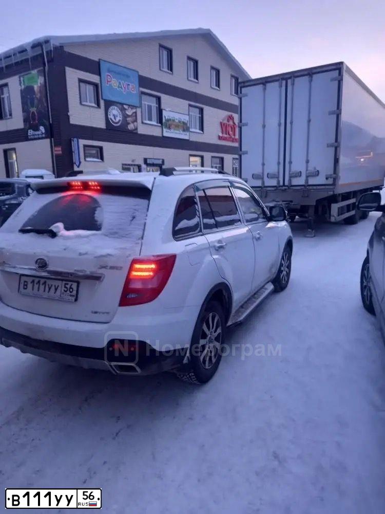 Фото автомобиля KIA RIO, 2011 — госномер В111УУ56. Цвет: голубой