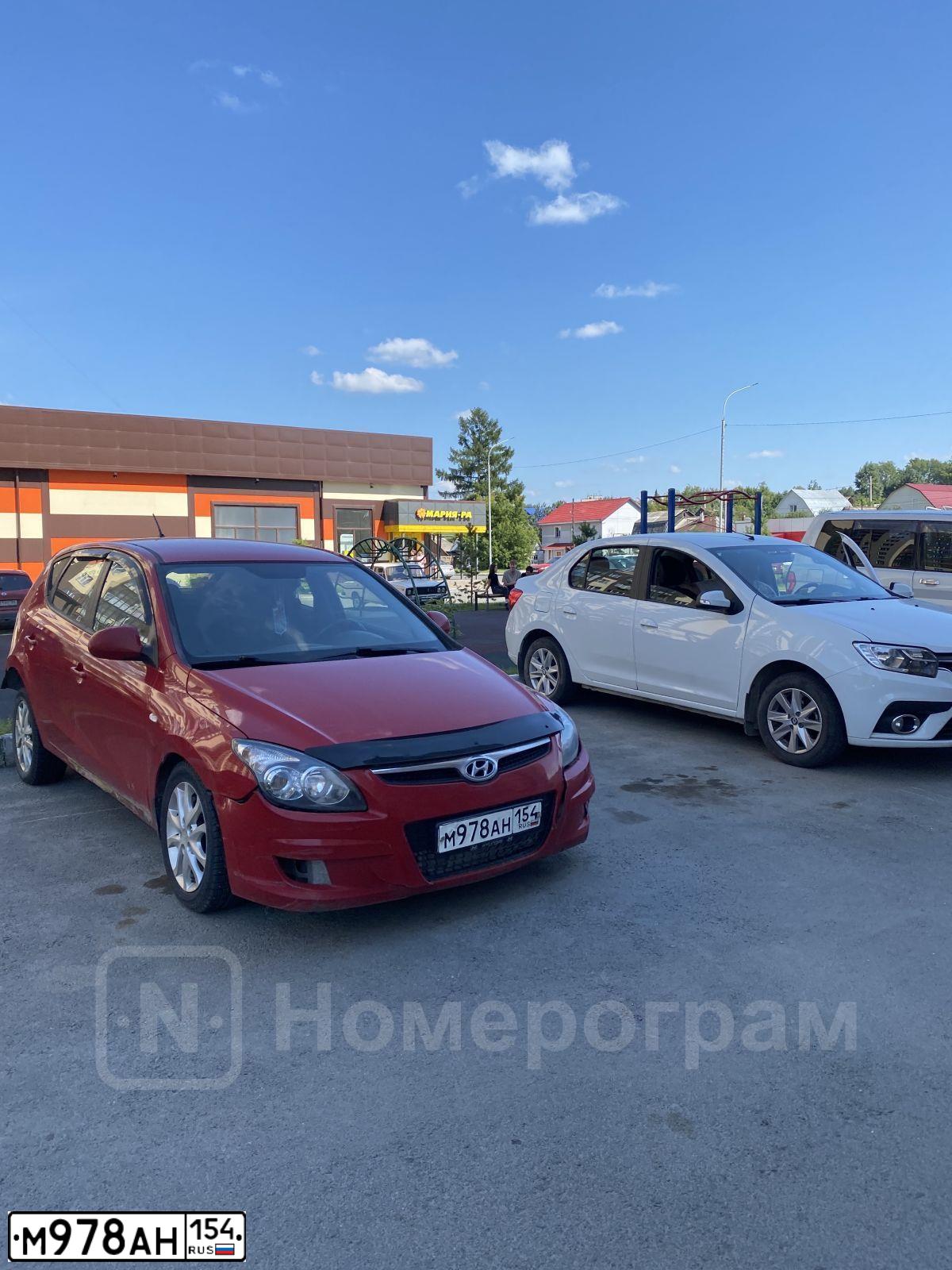 Фото автомобиля HYUNDAI I30, 2009 — госномер М978АН154. Цвет: КРАСНЫЙ