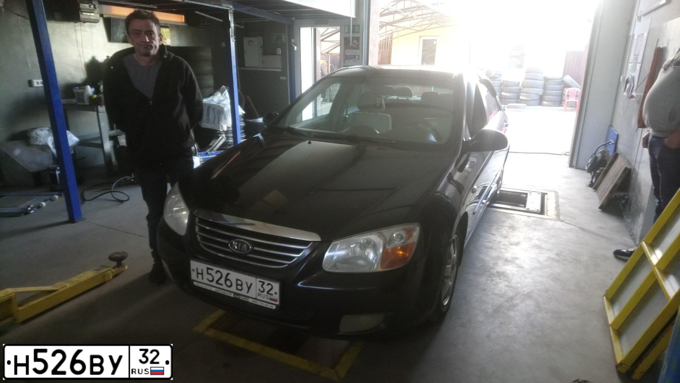 Фото автомобиля KIA CERATO, 2007 — госномер Е222МА48. Цвет: ЧЕРНЫЙ