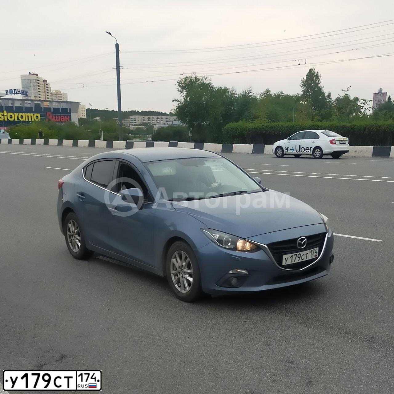 Фото автомобиля MAZDA 3, 2014 — госномер У179СТ174. Цвет: СЕРО-ГОЛУБОЙ