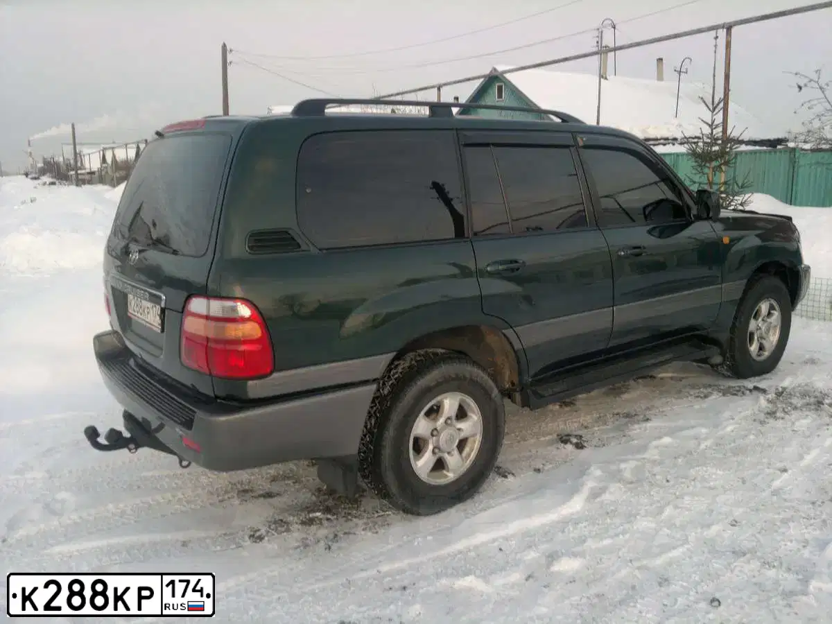Фото автомобиля TOYOTA LANDCRUISER, 2000 — госномер С193КТ774. Цвет: ЗЕЛЕНЫЙ