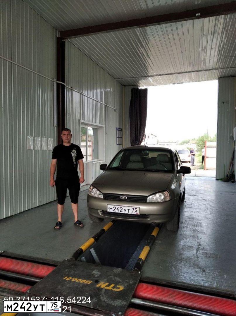 Фото автомобиля LADA 1117 KALINA, 2012 — госномер О416КМ75. Цвет: СЕРО-БЕЖЕВЫЙ