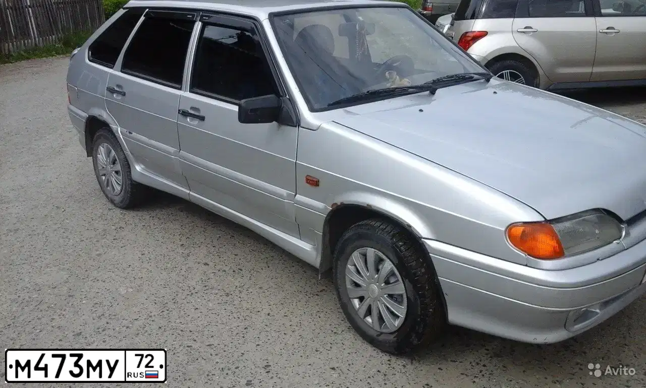 Фото автомобиля LADA 2114 SAMARA, 2007 — госномер М473МУ72. Цвет: Серебристый