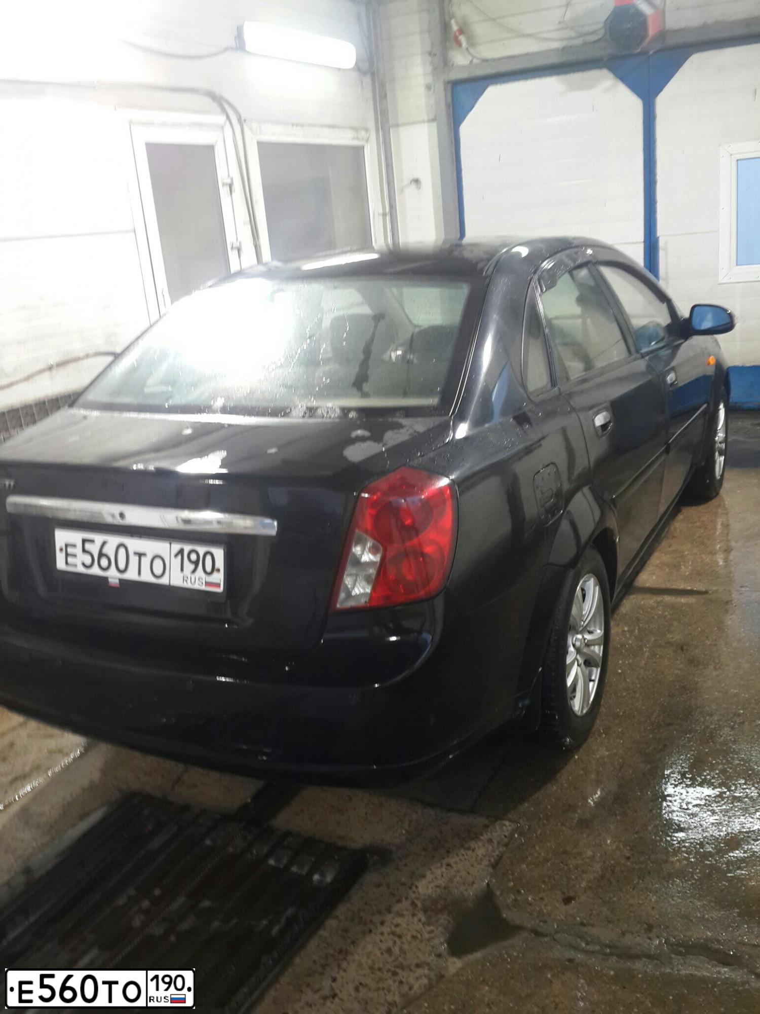 Фото автомобиля DAEWOO LACETTI, 2003 — госномер Е560ТО190. Цвет: ЧЕРНЫЙ