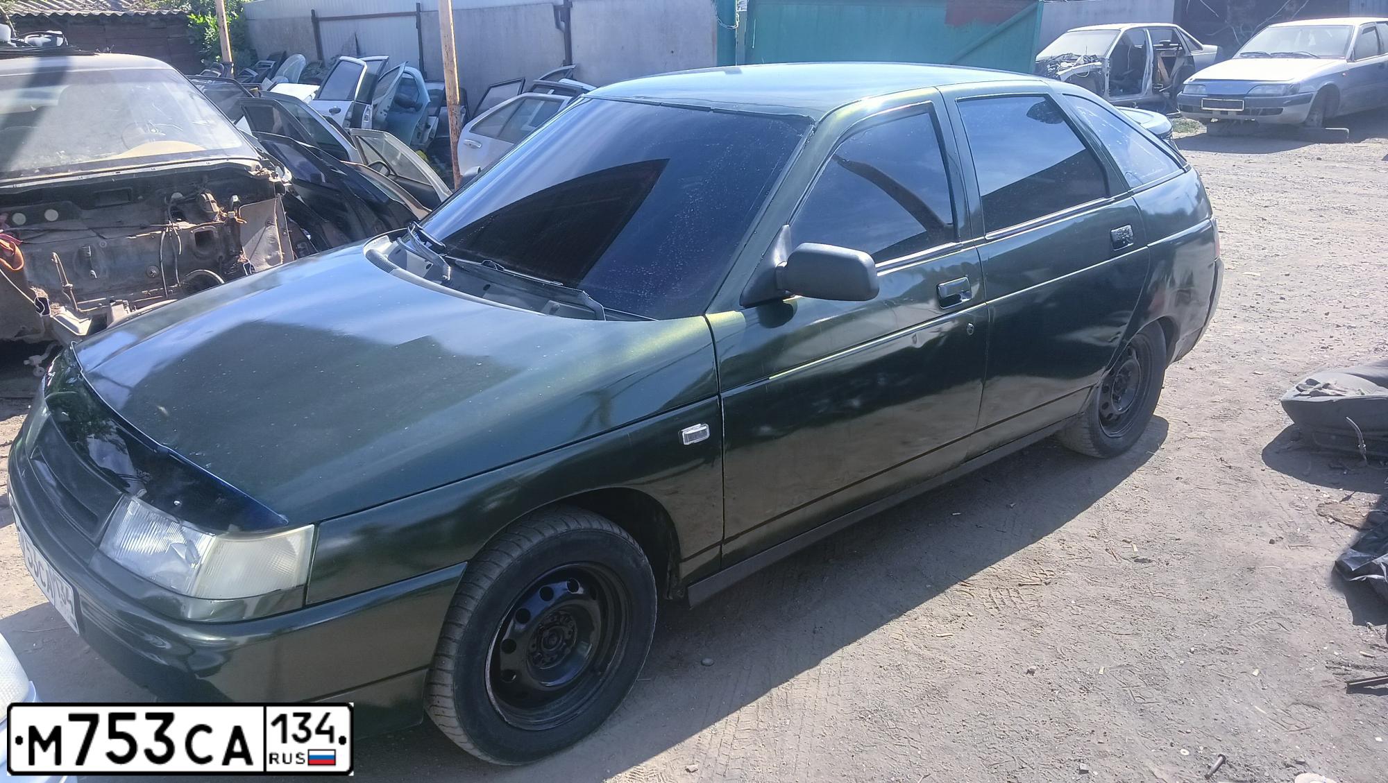 Фото автомобиля LADA 2112, 2004 — госномер М753СА134. Цвет: ТЕМНО ЗЕЛЕНЫЙ