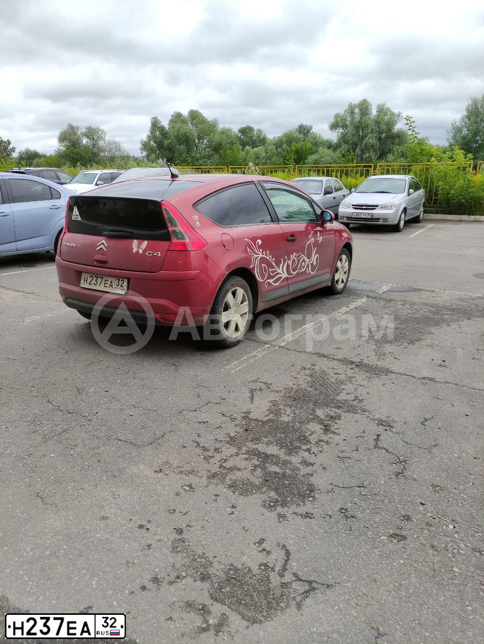 Фото автомобиля CITROEN C4, 2005 — госномер Н237ЕА32. Цвет: КРАСНЫЙ