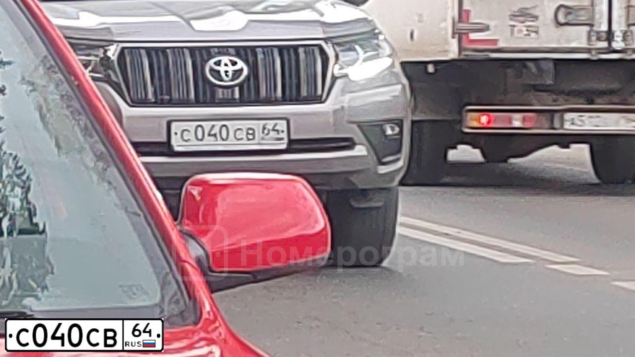 Фото автомобиля MITSUBISHI OUTLANDER, 2011 — госномер С040СВ64. Цвет: КОРИЧНЕВЫЙ