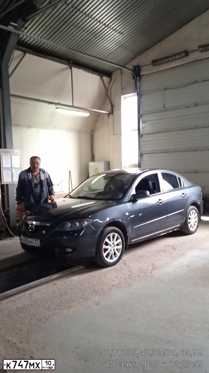 Фото автомобиля MAZDA 3, 2006 — госномер М034УЕ33. Цвет: ТЕМНО-СЕРЫЙ