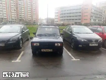 Фото автомобиля KIA CERATO, 2012 — госномер К987УЕ197. Цвет: ЧЕРНЫЙ