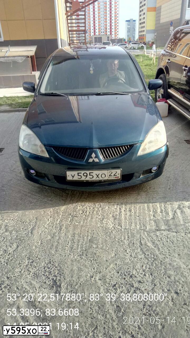 Фото автомобиля MITSUBISHI LANCER, 2006 — госномер Н470СТ24. Цвет: СИНИЙ