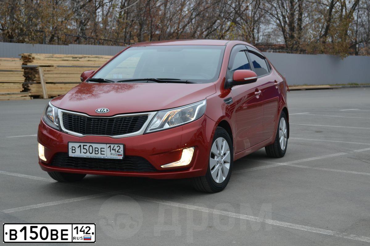 Фото автомобиля KIA RIO, 2012 — госномер В150ВЕ142. Цвет: Красный
