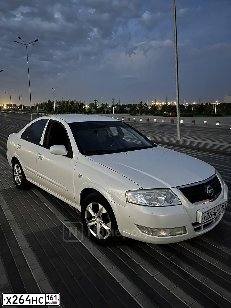 Фото автомобиля NISSAN ALMERA, 2007 — госномер Х264НС161. Цвет: БЕЛЫЙ