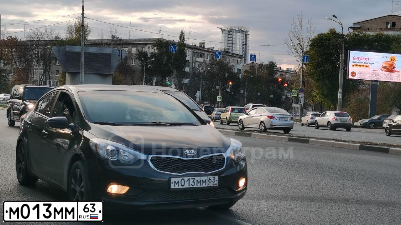 Фото автомобиля KIA CERATO, 2014 — госномер М013ММ63. Цвет: ЧЕРНЫЙ