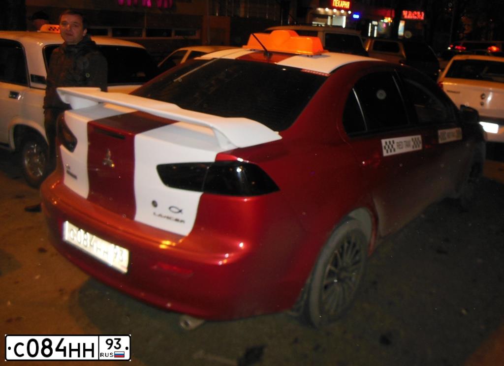 Фото автомобиля MITSUBISHI LANCER, 2007 — госномер С084НН93. Цвет: БЕЛЫЙ