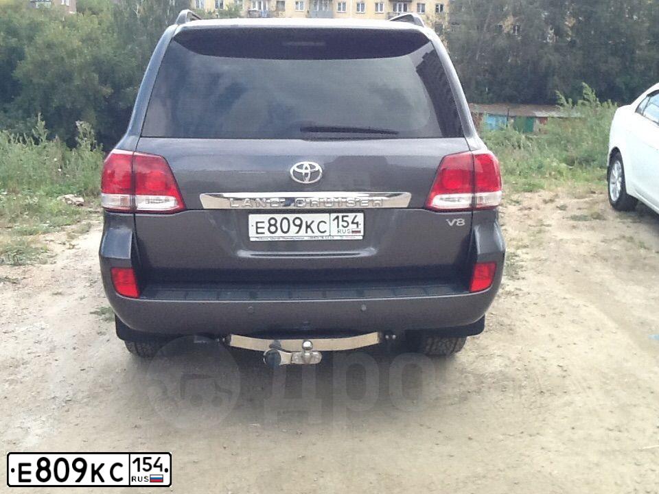 Фото автомобиля TOYOTA LANDCRUISER 200, 2010 — госномер В128ОР76. Цвет: СЕРЫЙ