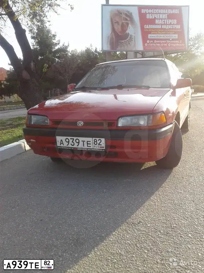 Фото автомобиля MAZDA 323, 1994 — госномер М847РТ82