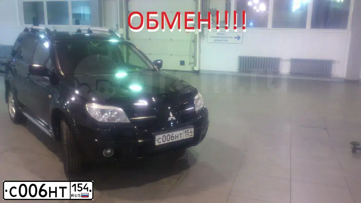 Фото автомобиля MITSUBISHI OUTLANDER, 2006 — госномер Х515МТ177. Цвет: ЧЕРНЫЙ
