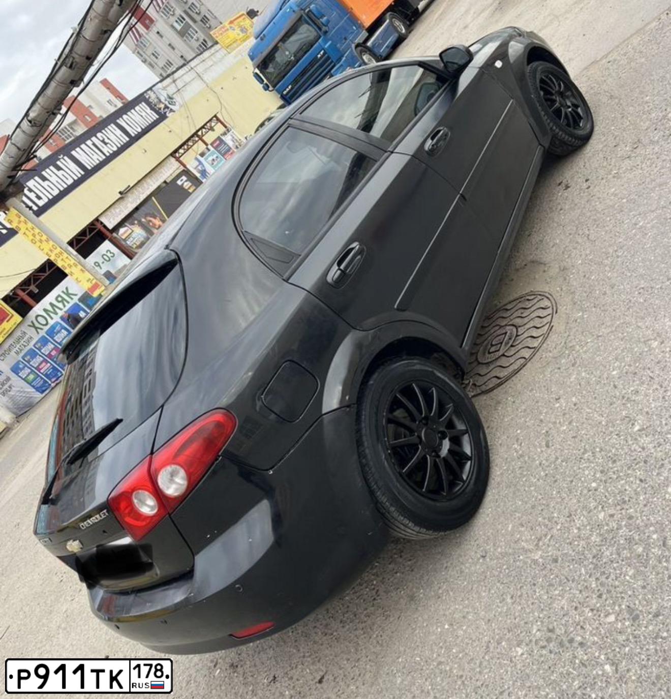 Фото автомобиля CHEVROLET LACETTI, 2007 — госномер О745ТВ05. Цвет: ЧЕРНЫЙ