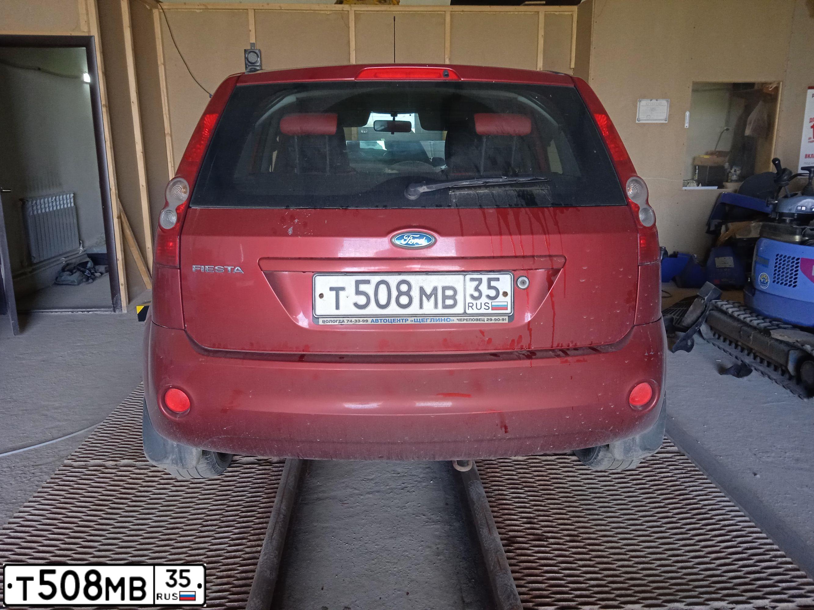 Фото автомобиля FORD FIESTA  ASPIRE, 2006 — госномер Т508МВ35. Цвет: ТЕМНО-КРАСНЫЙ