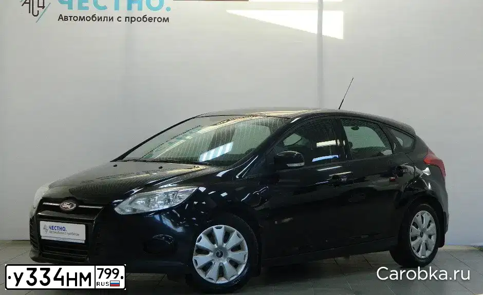 Фото автомобиля FORD FOCUS, 2012 — госномер М147НХ134. Цвет: ЧЕРНЫЙ