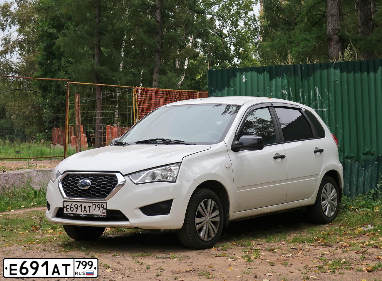 Фото автомобиля DATSUN N MI-DO, 2016 — госномер Е691АТ799. Цвет: Белый