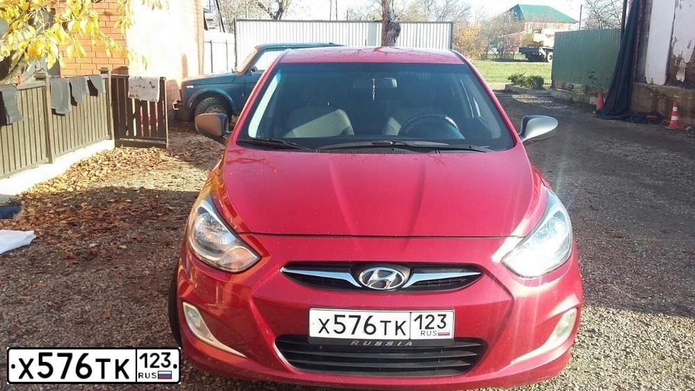 Фото автомобиля HYUNDAI SOLARIS, 2011 — госномер К015АМ15. Цвет: КРАСНЫЙ ГРАНАТ