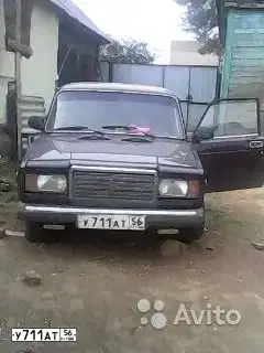 Фото автомобиля LADA 2107, 2001 — госномер У711АТ56. Цвет: ФИОЛЕТОВЫЙ