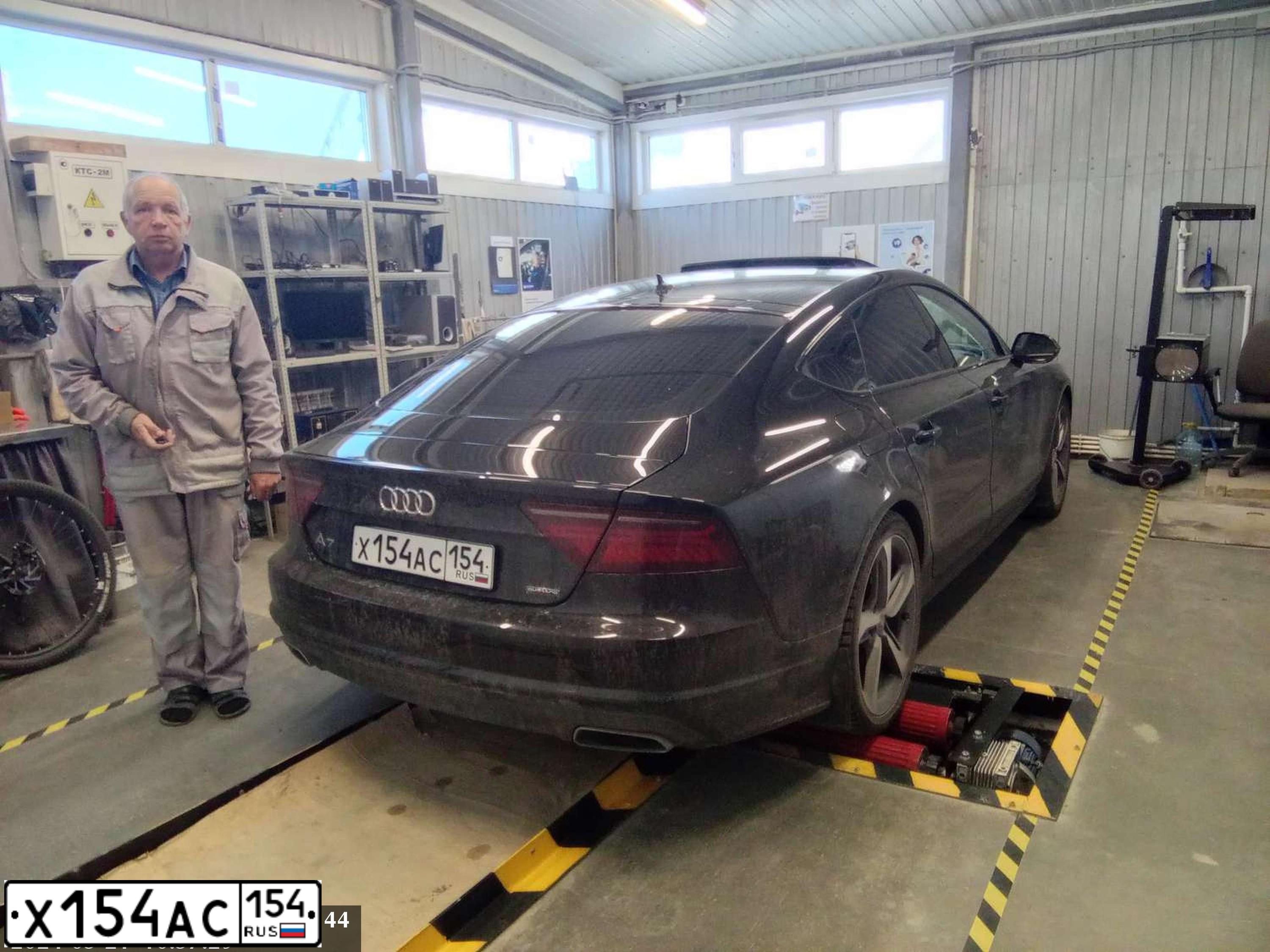 Фото автомобиля AUDI A7, 2016 — госномер Р077РР86. Цвет: ЧЕРНЫЙ
