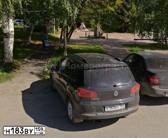 Фото автомобиля VOLKSWAGEN TIGUAN, 2012 — госномер Н183ВУ159. Цвет: ЧЕРНЫЙ