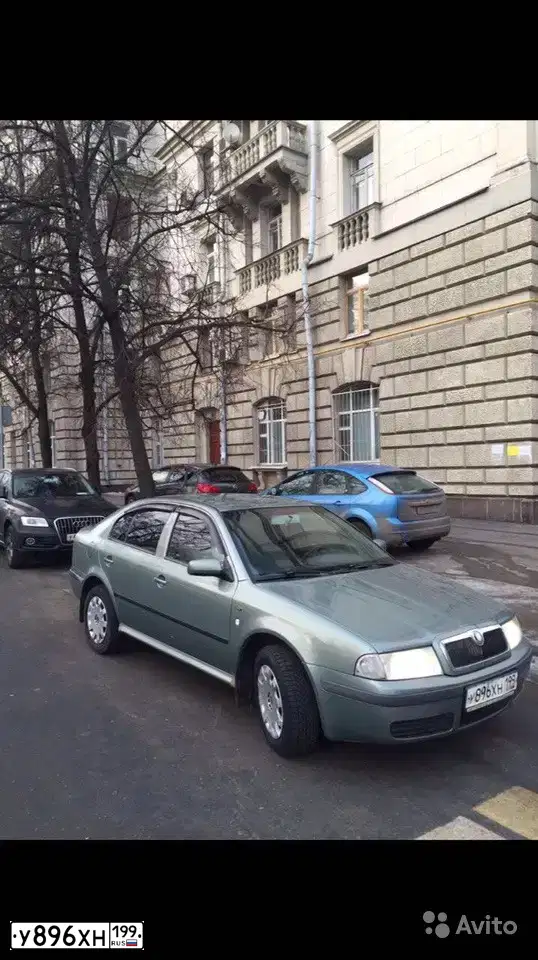 Фото автомобиля SKODA OCTAVIA, 2002 — госномер М034ЕТ35. Цвет: СЕРО-ЗЕЛЕНЫЙ