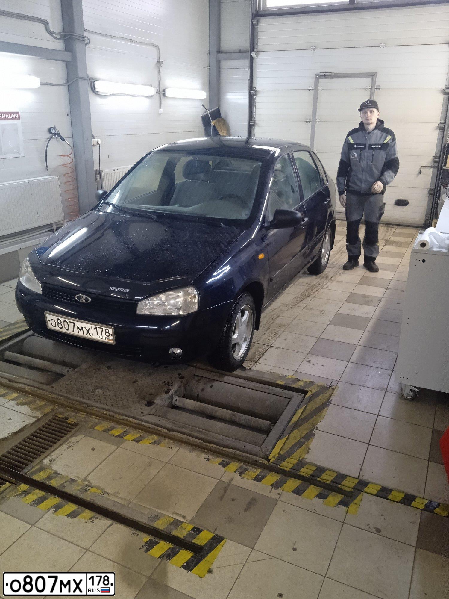 Фото автомобиля LADA KALINA, 2008 — госномер Н248АУ198. Цвет: Темный Сине-Фиолетовый