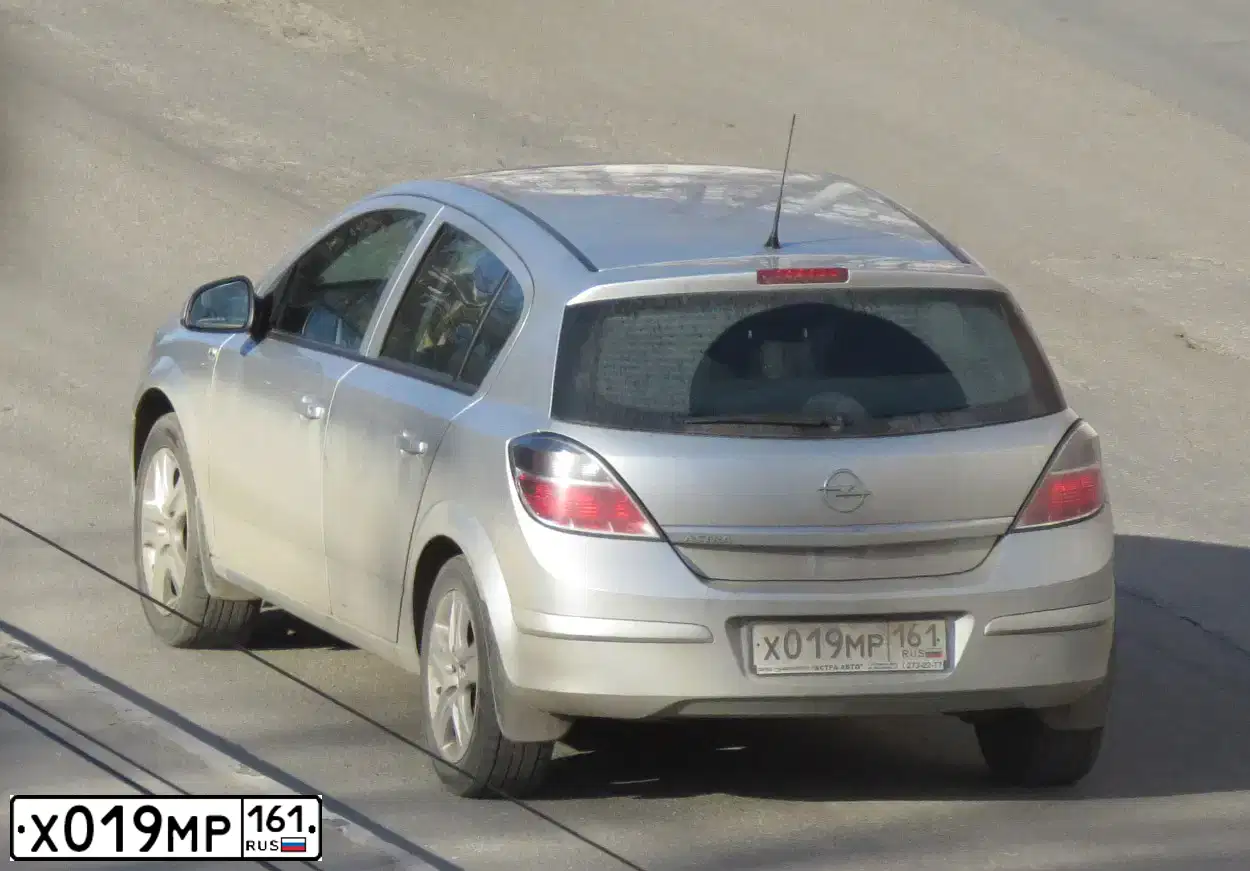 Фото автомобиля OPEL ASTRA, 2010 — госномер Х019МР161. Цвет: СЕРЕБРИСТЫЙ