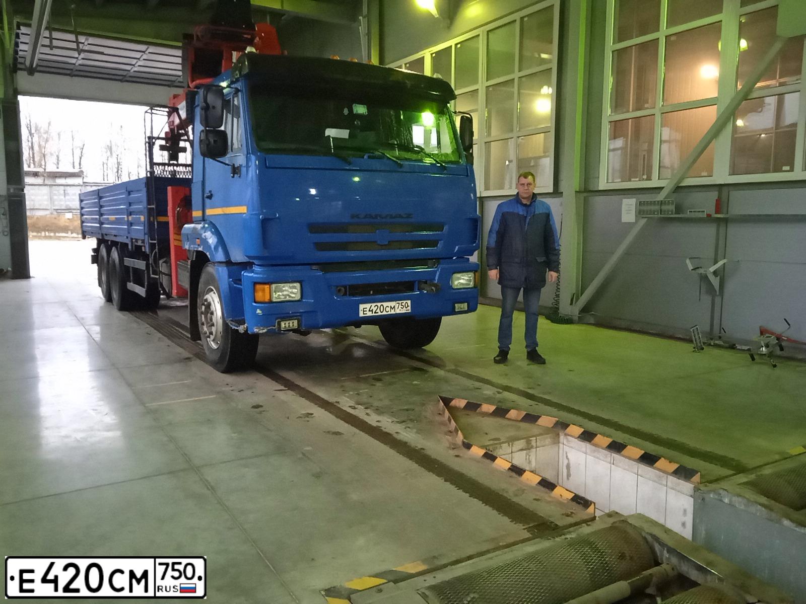 Фото автомобиля KAMAZ 65117 /6X4/, 2012 — госномер Е420СМ750. Цвет: синий