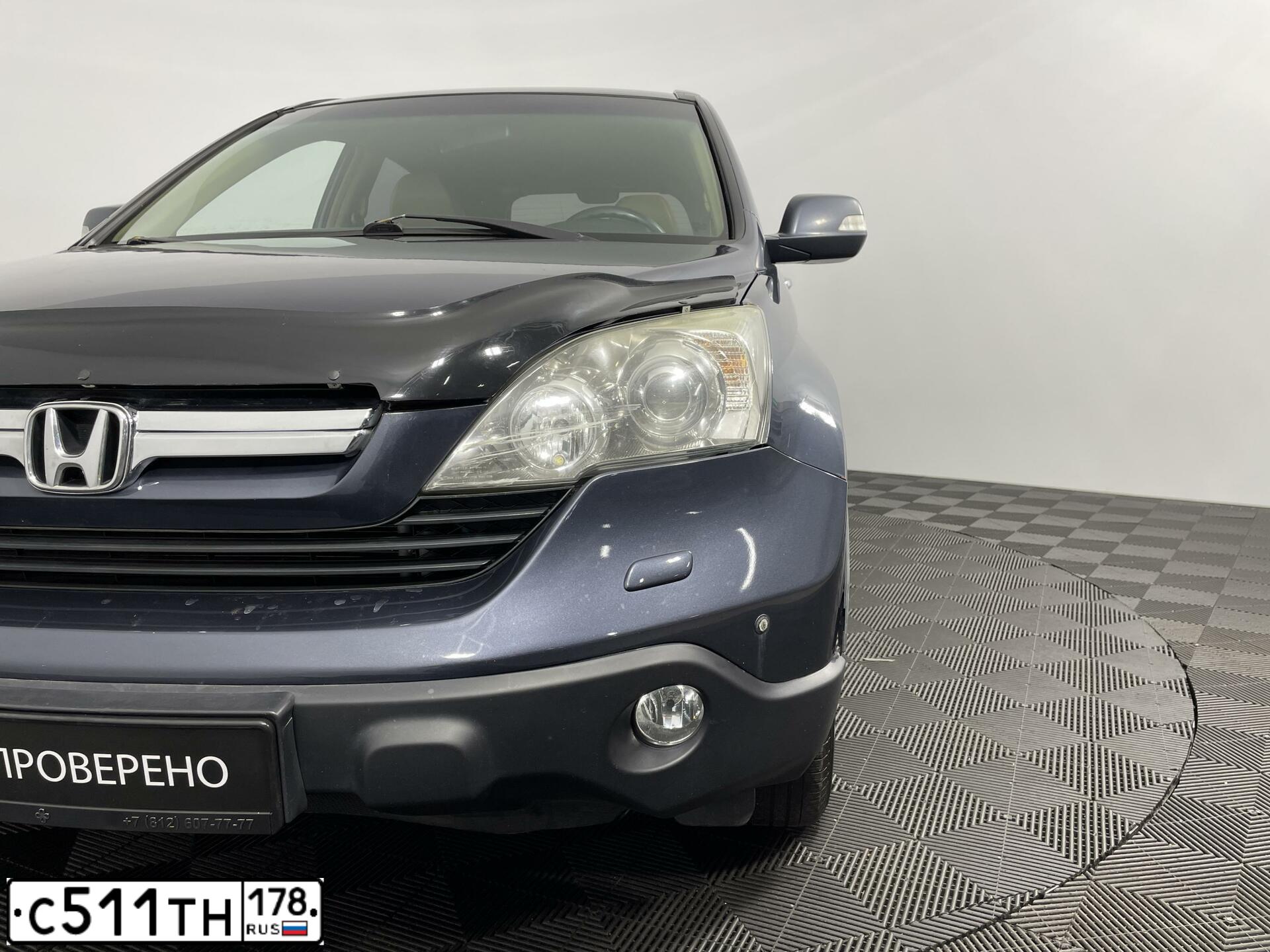 Фото автомобиля HONDA CR-V, 2007 — госномер Н134ВА10. Цвет: ТЕМНО-СЕРЫЙ
