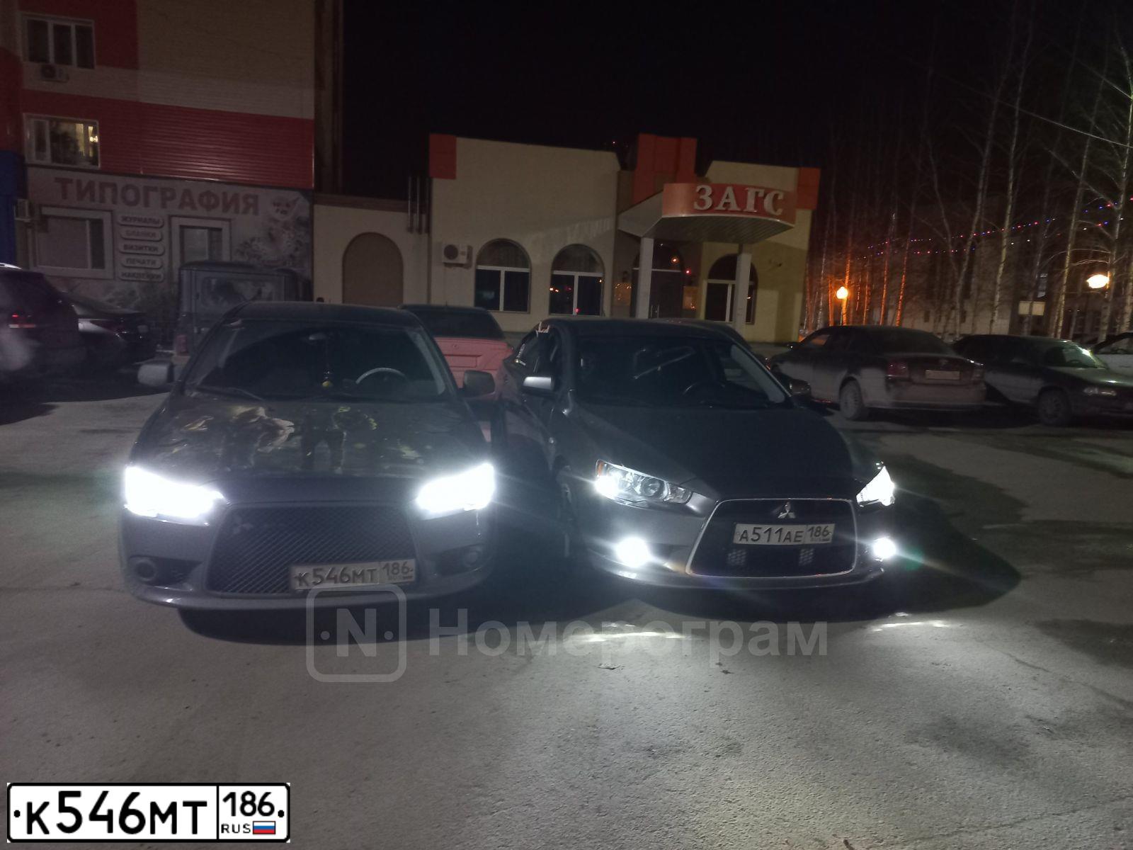 Фото автомобиля MITSUBISHI LANCER, 2011 — госномер К546МТ186. Цвет: синий