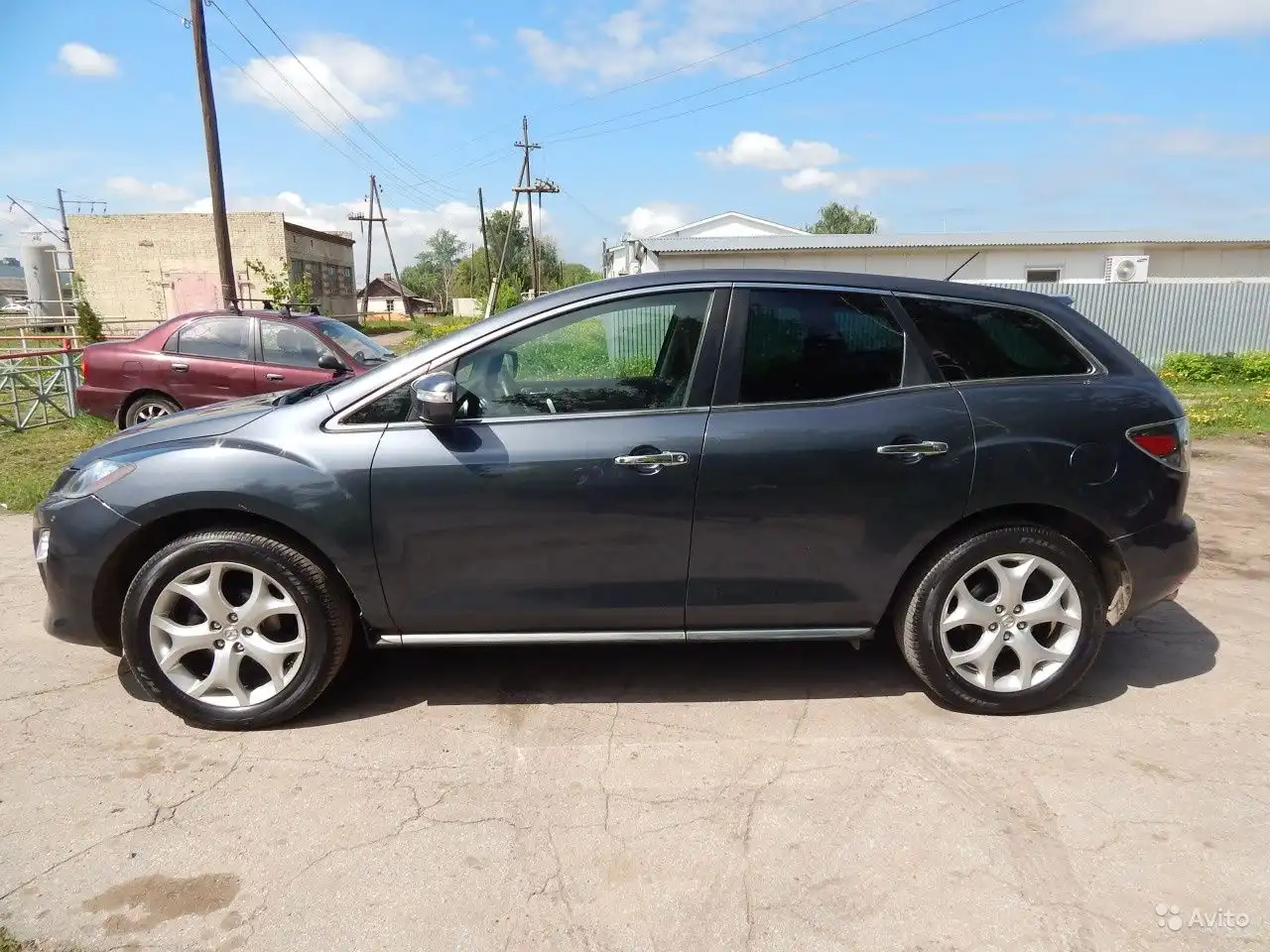 Фото автомобиля MAZDA CX-7, 2011 — госномер Т499УВ190. Цвет: СЕРЫЙ