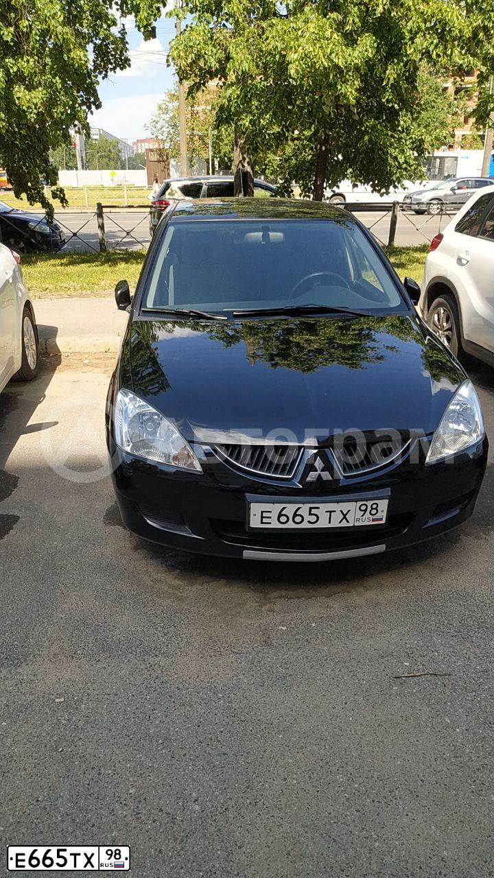 Фото автомобиля MITSUBISHI LANCER, 2005 — госномер Е665ТХ98. Цвет: ЧЕРНЫЙ
