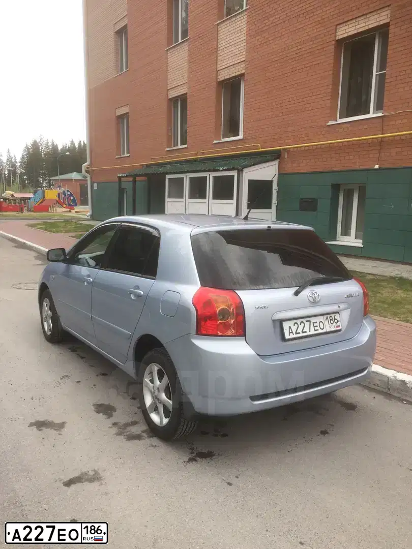 Фото автомобиля TOYOTA COROLLA, 2006 — госномер Т555УР86. Цвет: СВЕТЛО-ГОЛУБОЙ