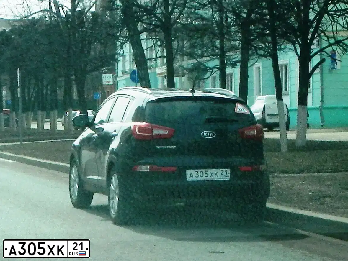 Фото автомобиля KIA SPORTAGE, 2011 — госномер К510ТН21. Цвет: ЧЕРНЫЙ ПЕРЛАМУТР