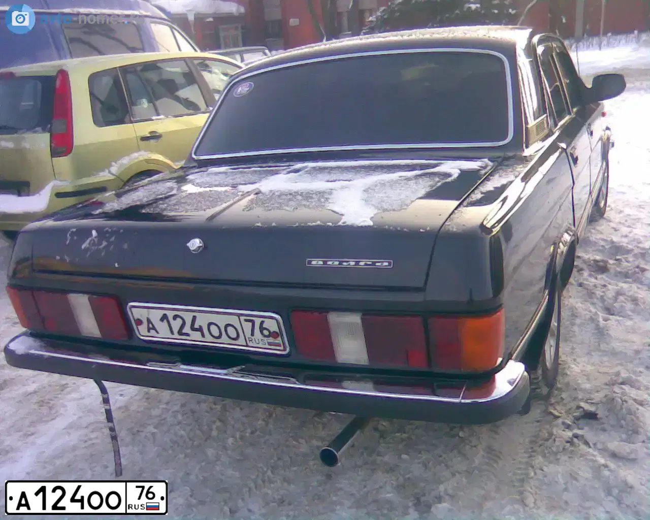 Фото автомобиля GAZ 3102 WOLGA, 2004 — госномер А124ОО76. Цвет: ЧЕРНЫЙ