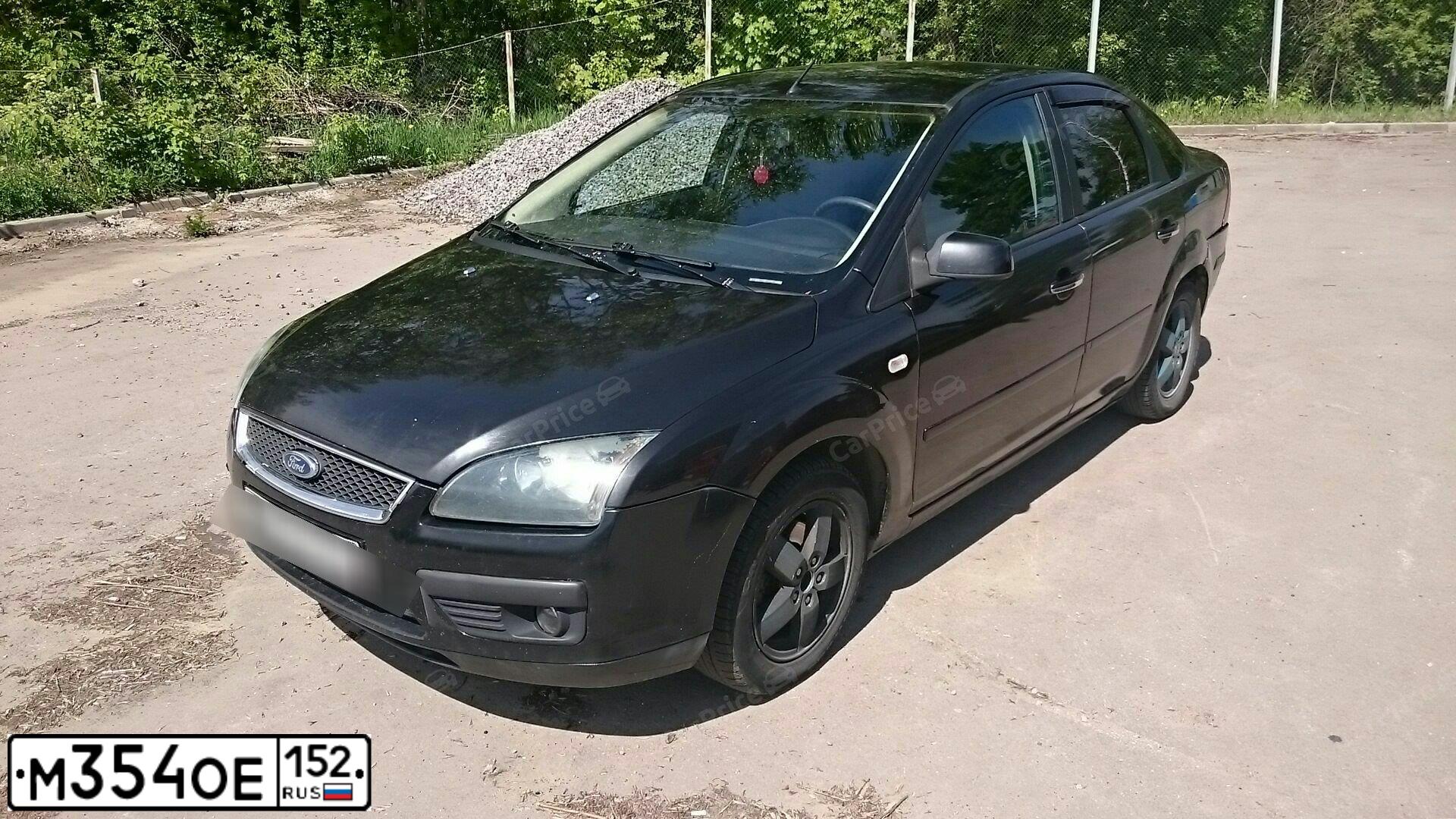 Фото автомобиля FORD FOCUS, 2006 — госномер В515КН152. Цвет: ЧЕРНЫЙ
