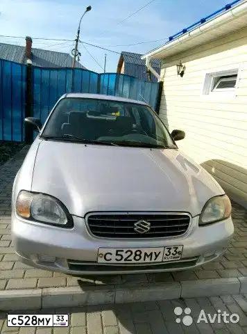 Фото автомобиля SUZUKI ESTEEM, 2001 — госномер В882ВХ76. Цвет: Серебристый