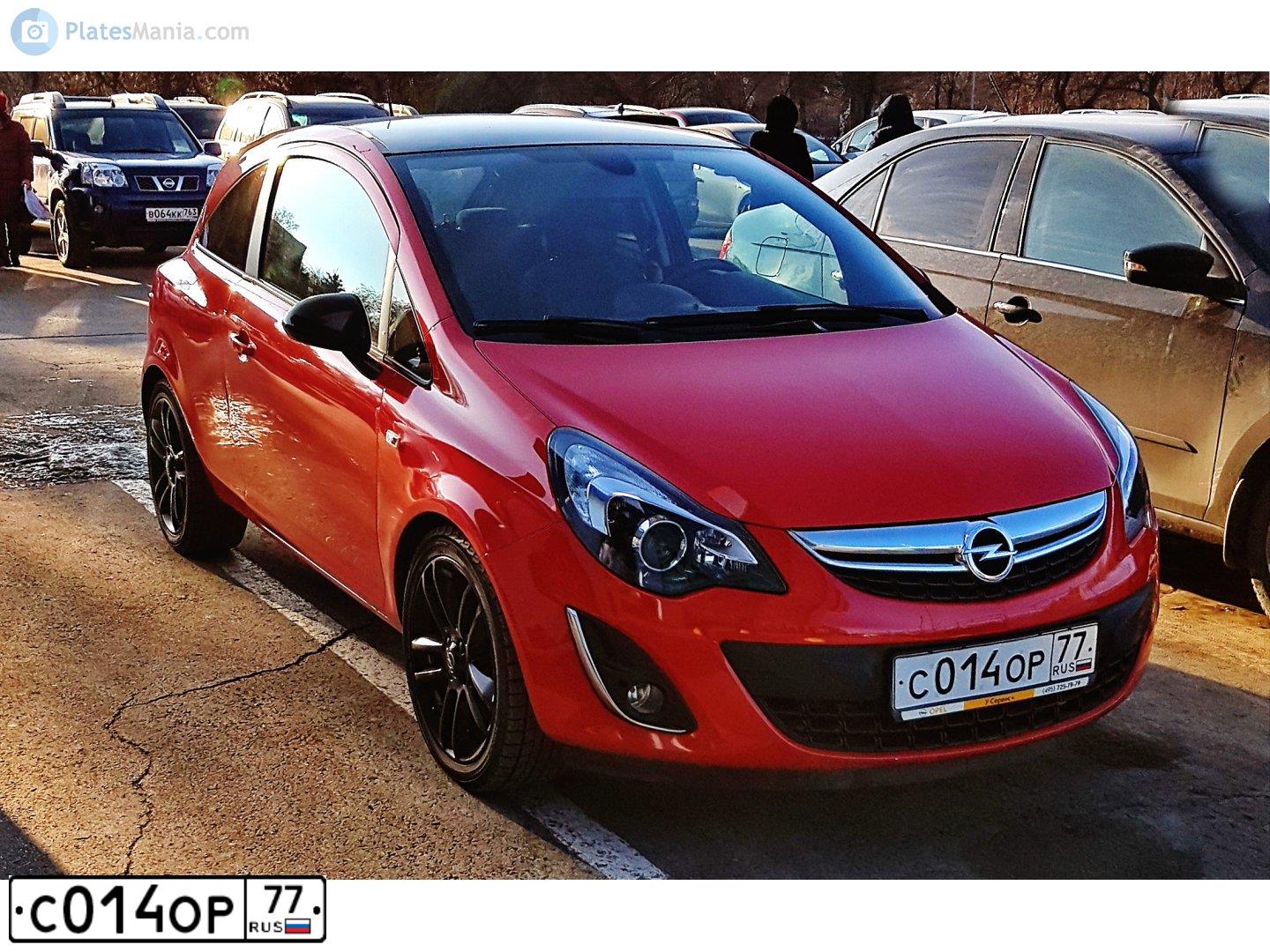 Фото автомобиля OPEL CORSA, 2013 — госномер Н696СХ73. Цвет: Красный