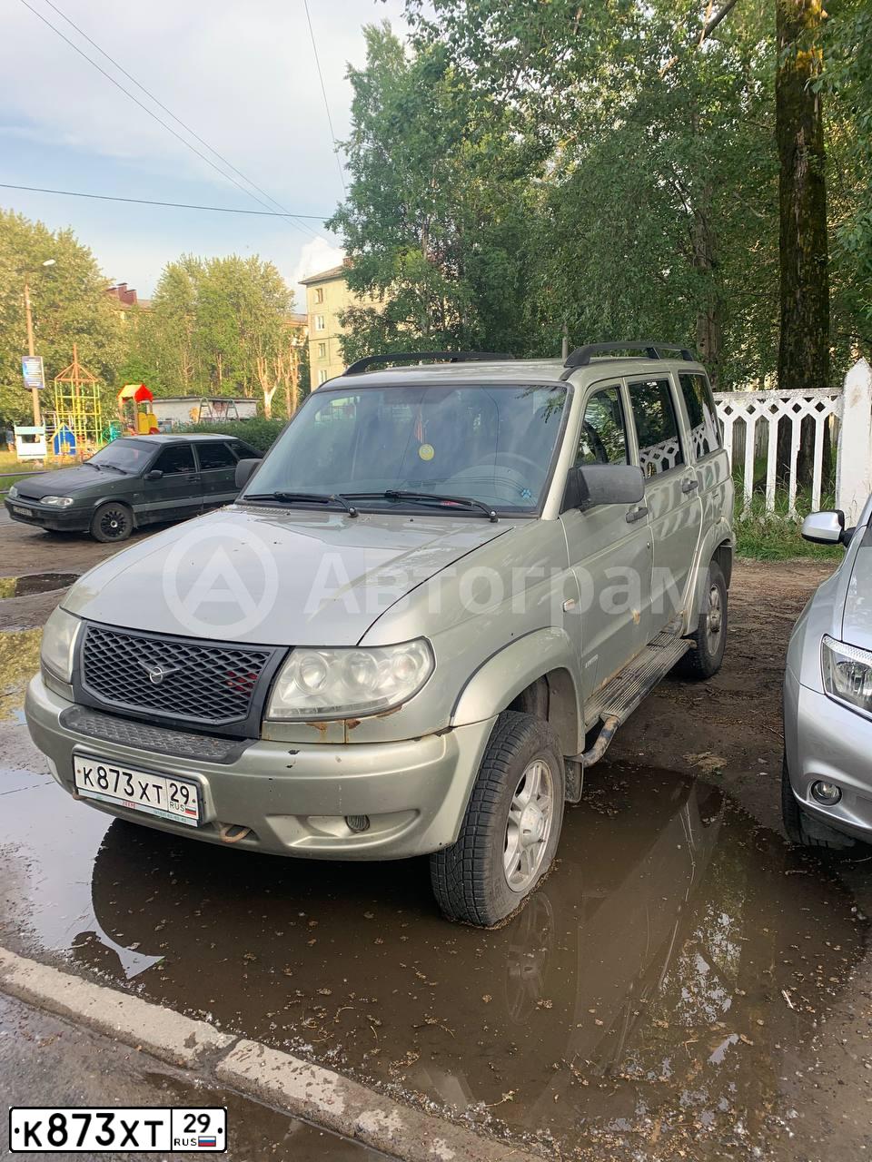 Фото автомобиля UAZ 3163 PATRIOT, 2013 — госномер К873ХТ29. Цвет: СЕРЕБР.ЖЕЛТЫЙ МЕТАЛЛИК