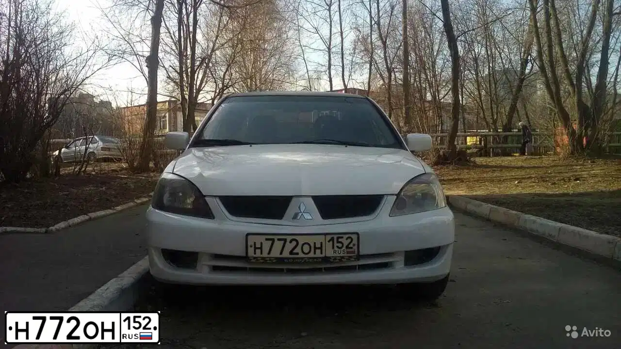 Фото автомобиля MITSUBISHI LANCER, 2005 — госномер Н772ОН152. Цвет: БЕЛЫЙ