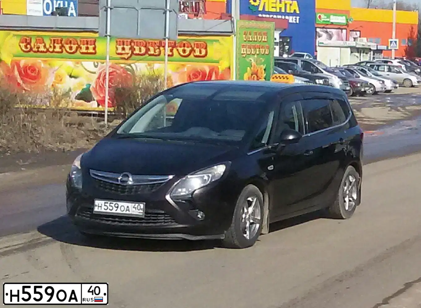 Фото автомобиля OPEL ZAFIRA, 2012 — госномер К375АН82. Цвет: Коричневый