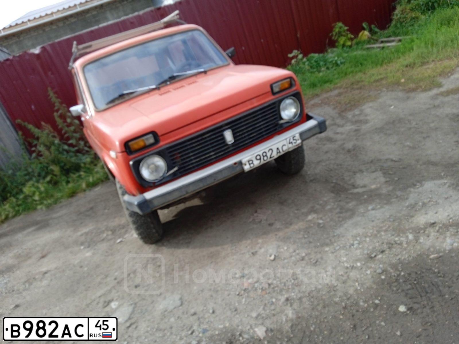 Фото автомобиля LADA 2121 NIVA, 1988 — госномер В982АС45. Цвет: КРАСНЫЙ
