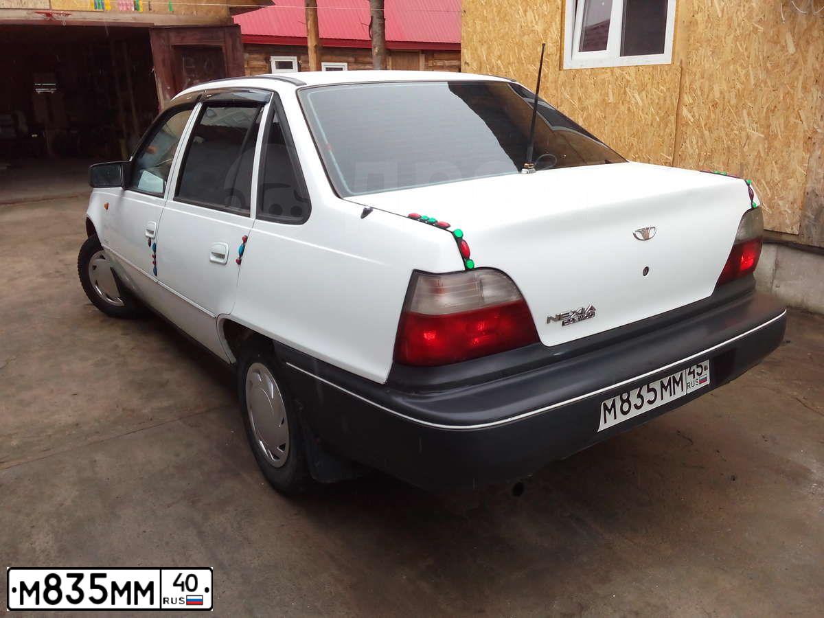 Фото автомобиля MERCEDES E-KLASSE, 1994 — госномер М835ММ40. Цвет: Коричневый